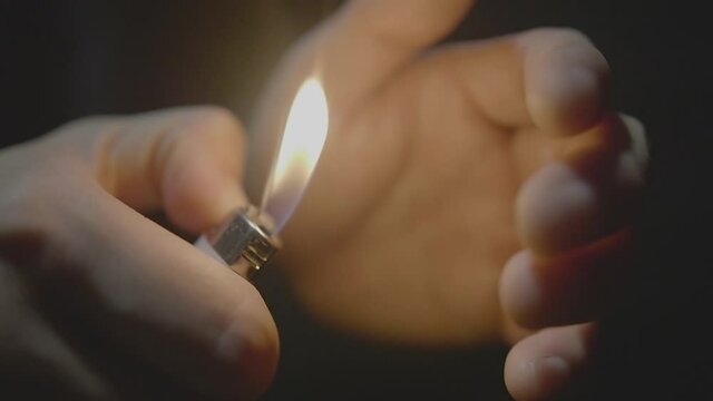 Slow motion flicking the lighter.