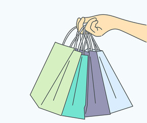 Fototapeta na wymiar Shopping, sale, choice, store, buy concept. Human character hand holding shopping bags. Hand drawn in thin line style, vector illustrations.