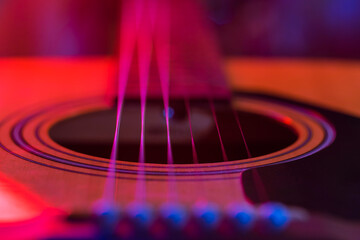 Details of an acoustic guitar, detailed photos of a guitar, guitar strings and soundhole, abstract,...