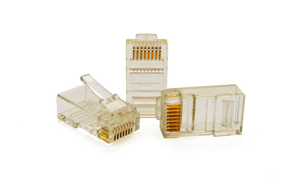 three connectors RG45 on a white background, isolated, macro