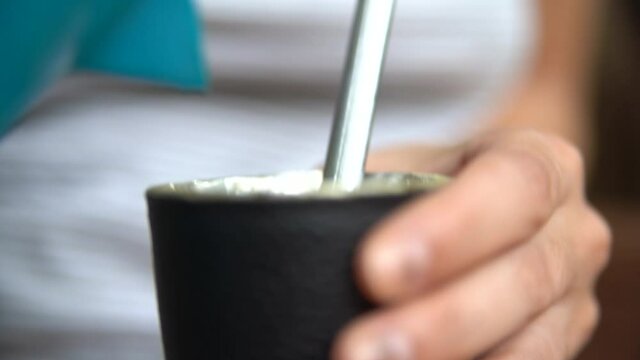 close up woman holding cold tea