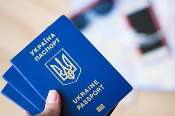 three ukrainian passports on the map, travel concept, travel to holiday, trip to europe