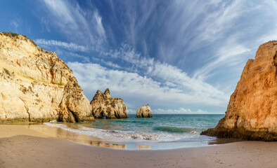 Landscape with Praia dos Tres Irmaos, famous beach in Algarve, Portugal