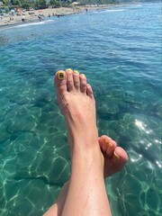 feet on the beach