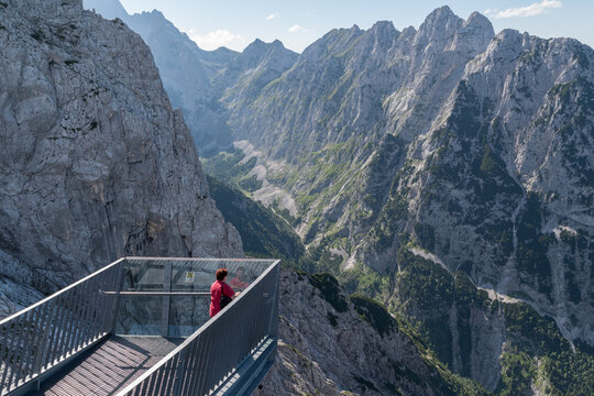 Tourist stay at the viewing platform around the mountain Alpspitze.