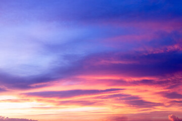 Colorful sky background in twilight after sunset, with magenta, blue and red