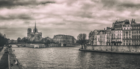 Fototapeta premium Vintage view of Paris across Seine River