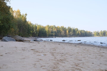 Autumn sandy shore of Lake Ladoga
