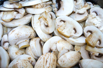 champignon mushrooms sliced food background