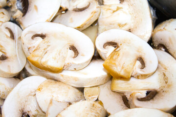 champignon mushrooms sliced food background