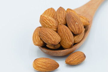 Almond nuts isolated on white background, Selective focus. Is a healthy food Rich in vitamins Fiber and Antioxidants.