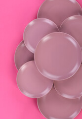 red kitchen ceramic plates isolated on red background