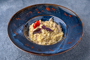 Pasta with ham. Natural delicious food. Greek cuisine menu. Still life in a marine style on a blue background.