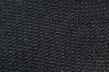 Black-and-white ribbed wool fabric. Seamless pattern. Natural background. Seamless fabric texture. Fashionable print.