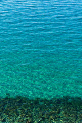 Fototapeta na wymiar Blue water background, Dilek Peninsula National Park in Turkey, 