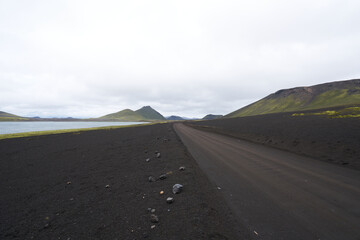 Black sand ash vulcanic landscape highland roads in iceland 2020