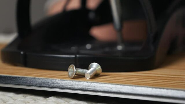 The process of attaching bindings to your snowboard at home. Prepares the snowboard for the winter trip
