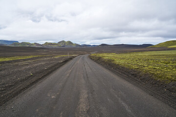 Black sand ash vulcanic landscape highland roads in iceland 2020