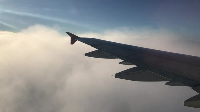 Flying over clouds on an aeroplane