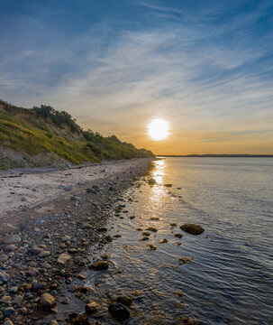 Panorama view of sunset on the steep coast of the Baltic Sea.Panorama of wild romantic coastal cliff landscape at the Baltic Sea at the Wangels, by Hohwacht Bay, Ostholstein, Schleswig-Holstein.
