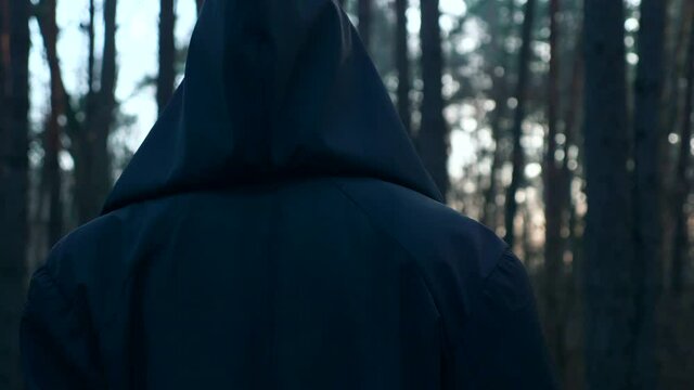 Wanderer in Black Cloak Cowl Walks Through Misty Forest. Wandering Monk Pilgrim. Autumn Morning. Mysterious Traveler. 2x Slow motion 60 fps 4K