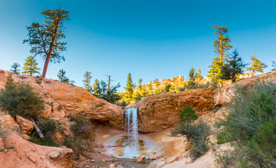 Hoodoos and Mossy Cave Waterfall, Bryce Canyon National Park, Utah, USA