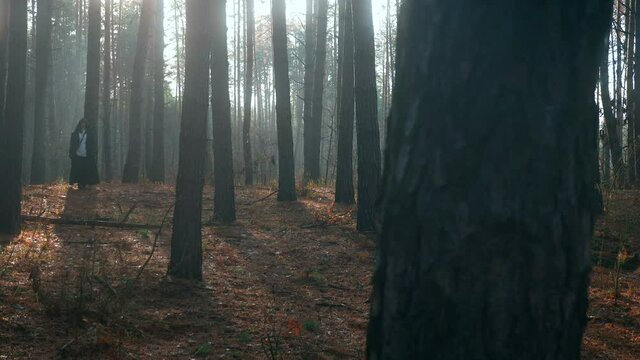  Wanderer in Black Cloak Cowl Walks Through Misty Forest. Wandering Monk Pilgrim. Autumn Morning. Mysterious Traveler. 2x Slow motion 60 fps 4K