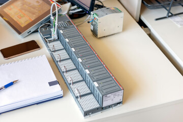 A programmable logic controller (PLC) or programmable controller. It is an industrial digital...