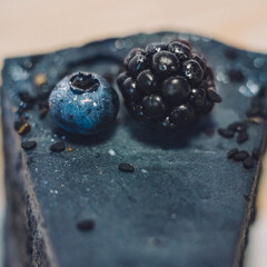 blueberry and blackberry on a cake
