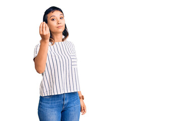 Young woman wearing casual clothes doing italian gesture with hand and fingers confident expression