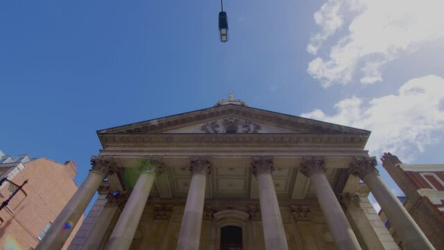 A London British Church in Mayfair, London in 4K. A great view with the blue sky of an English architectural building.