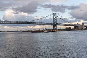 The iconic ben franklin bridge over the delaware river to new jersey travel