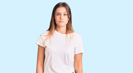 Fototapeta premium Beautiful caucasian woman wearing casual white tshirt looking sleepy and tired, exhausted for fatigue and hangover, lazy eyes in the morning.