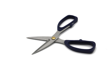 Scissors on white background board