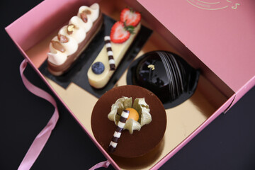Pink bakery box assorted desserts pastries