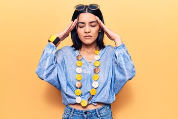 Young beautiful latin woman wearing casual clothes with hand on head, headache because stress. suffering migraine.