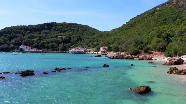 Aerial Views of Portinho da Arr&aacute;bida, Creiro Beach and Turquoise Atlantic Coast in Portugal