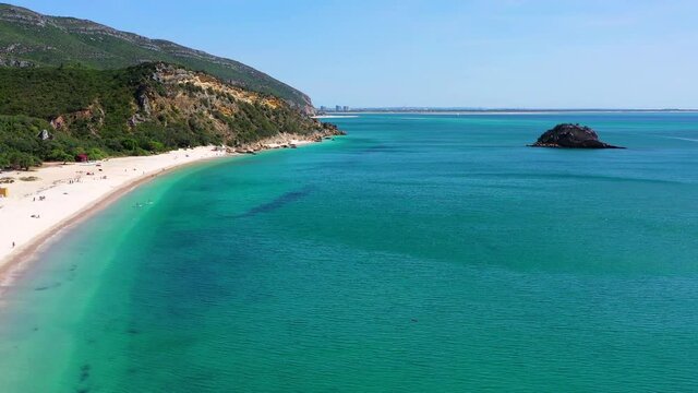 Aerial Views of Portinho da Arr&aacute;bida, Creiro Beach and Turquoise Atlantic Coast in Portugal