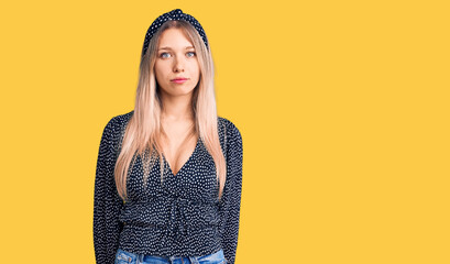 Young beautiful blonde woman wearing casual clothes looking sleepy and tired, exhausted for fatigue...