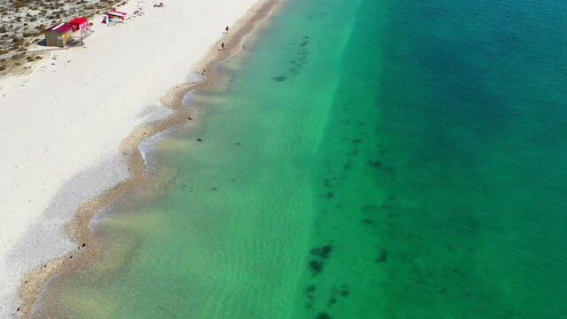 Aerial Views of Portinho da Arr&aacute;bida, Creiro Beach and Turquoise Atlantic Coast in Portugal