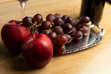 some red grapes on a plate