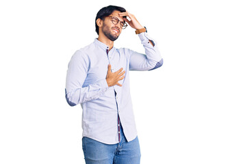 Handsome hispanic man wearing business shirt and glasses touching forehead for illness and fever, flu and cold, virus sick