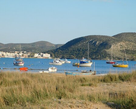 Fishing and recreation boats in a bay near the resort town of Anavyssos, Attica, Greece