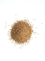 Heap of organic natural sesame seeds over isolated on white background