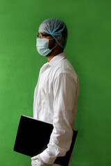 young doctor holding patient file in covid-19