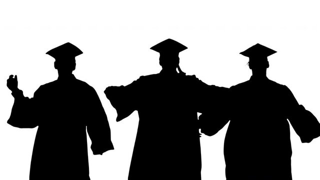 Silhouette Three male graduates in robes and mortarboards dancing in synch.