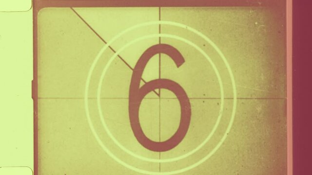 16mm film showing framing and bleeding edge. Countdown clock from 8 to 2.