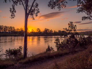 Beautiful Riverside Sunset with Reflections