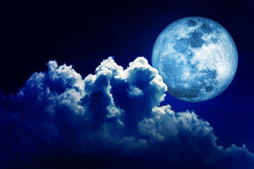 Obraz premium Full moon in blue lighting night sky background with clouds. (Elements of this image furnished by NASA.)