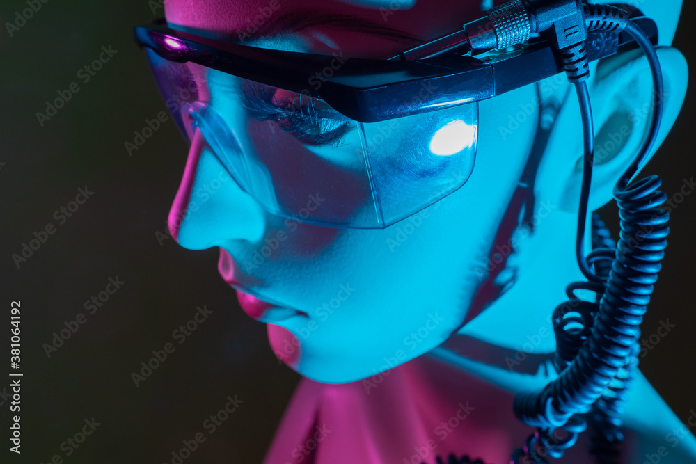 Poster close-up of the robot face. artificial intelligence. a female cyborg. controlled robots. development